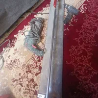 یک عدد کاشی بور و یک عدد دریل ۳کاره