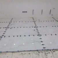 نصب کاشی بدنه وسرامیک کف به صورت چسبی ودوغابی