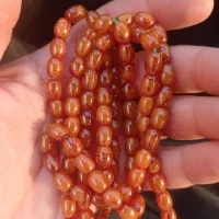 تسبیح صدویک کهربا کامل رنگ گرفته