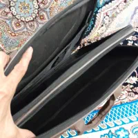 کیف لب تاپ و گاو صنندوق