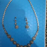 طلا به قیمت تابلو دستبند و نیم ست گوشواره زنجیر