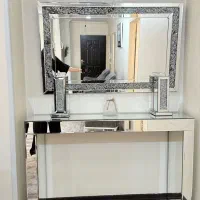 آینه و کنسول، ساعت آینه ای