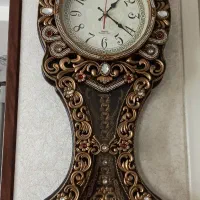 ساعت دیواری آونگدار تزیینی