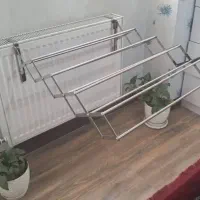رخت اویز تاشو مدل اکاردئونی نصب بر دیوار و شوفاژ