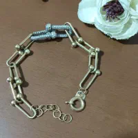 گوشواره و دستبند طلا با سه درصد