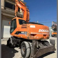 بیل مکانیکی لاستیکی دوسان
