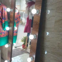 آیینه قدی و مانکن