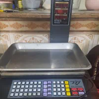 ترازو و کالباس بر