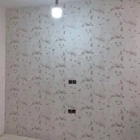 نصاب کاغذ دیواری