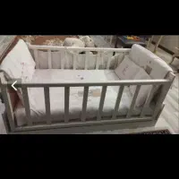 تخت گهواره‌ای کودک