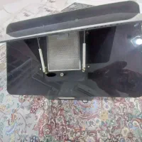 هود و میز تلویزیون