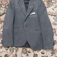 یک عدد کت و شلوار و کفش مجلسی