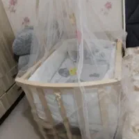 تخت نوزاد کنار مادر همراه تشک