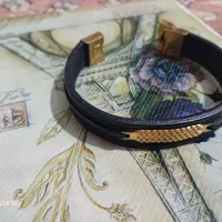 دستبند چرم طلا