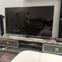 تلویزیون و میز تلویزیون به همراه سینما خانواده