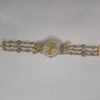 ساعت سواچ swatch اصل طلایی