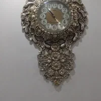 ساعت دیواری در حد نو کم کارر کرده سالم