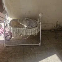 یک گهواره بچه برقی با ساز سالم دستی وبرقی