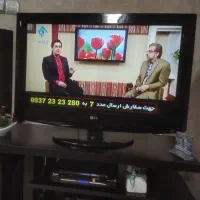 تلویزیون 32 اینچ  الجی و زیر تلویزیون