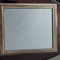 آینه قدیمی با قاب دور سیلور
