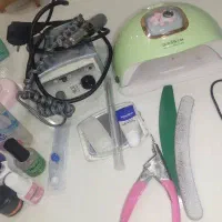 دستگاه سوهان و. وسایل ناخون کاری