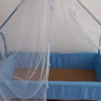 گهواره کودک فلزی