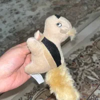 عروسک کوچک فشاری