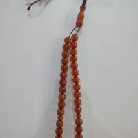 تسبیح کهربا رگ دار