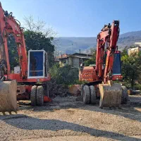 بیل مکانیکی بیل لاستیکی پوکلن  چنگ ضایعات