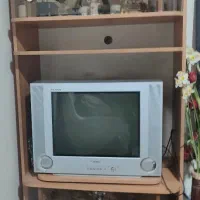 تلویزیون سامسونگ به همراه میز tvو کنسول قاشق چنگال