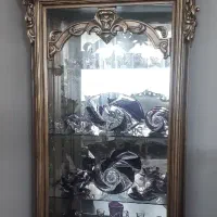 بوفه چوبی و ساعت برنجی