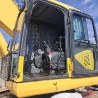 معاوضه بیل مکانیکی کوماتسو400 با آپارتمان