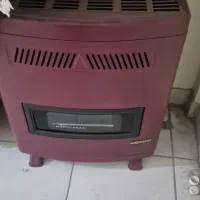 یخچال و گاز و دو تا فرش با بخاری