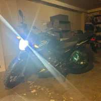 کیوجی NX150