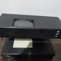 دستگاه پول تقلبی
