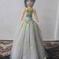 عروسک|اسباب‌بازی بچه|قم, دروازه چوبی|دیوار