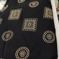پارچه نخی مشکی طرح دار