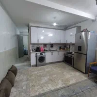آپارتمان ۹۰متری همکف راه جدا با پارکینگ کرکره برقی