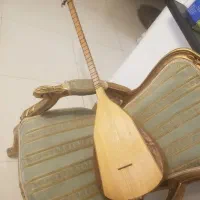 ساز ترکی باغلاما ، همراه با پوشش
