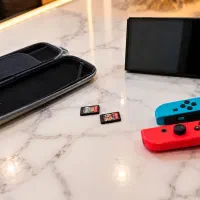 نینتندو سویچ OLED  قرمز و آبی تمیز