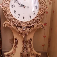 تابلو فرش و ساعت دیواری