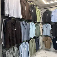 نیروی کار مغازه و انبار عمده فروشی پوشاک