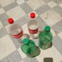 شیشه نوشابه و ظرف آشپزخونه