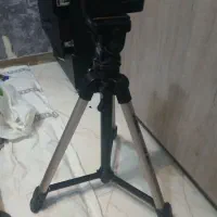 دوربین و سه پایه دوربین مدل کنون