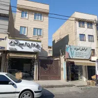 فروش-ساختمان-سه-طبقه-با-مغازه