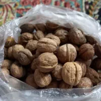 گردو بادام کشمش شیره انگور زعفران