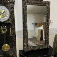 ایینه کنسول و ساعت ایستاده