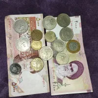 تعدادی اسکناس و سکه قدیمی