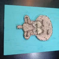 تابلو میخ و نخ.