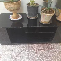 میزتلویزیون شیشه ای